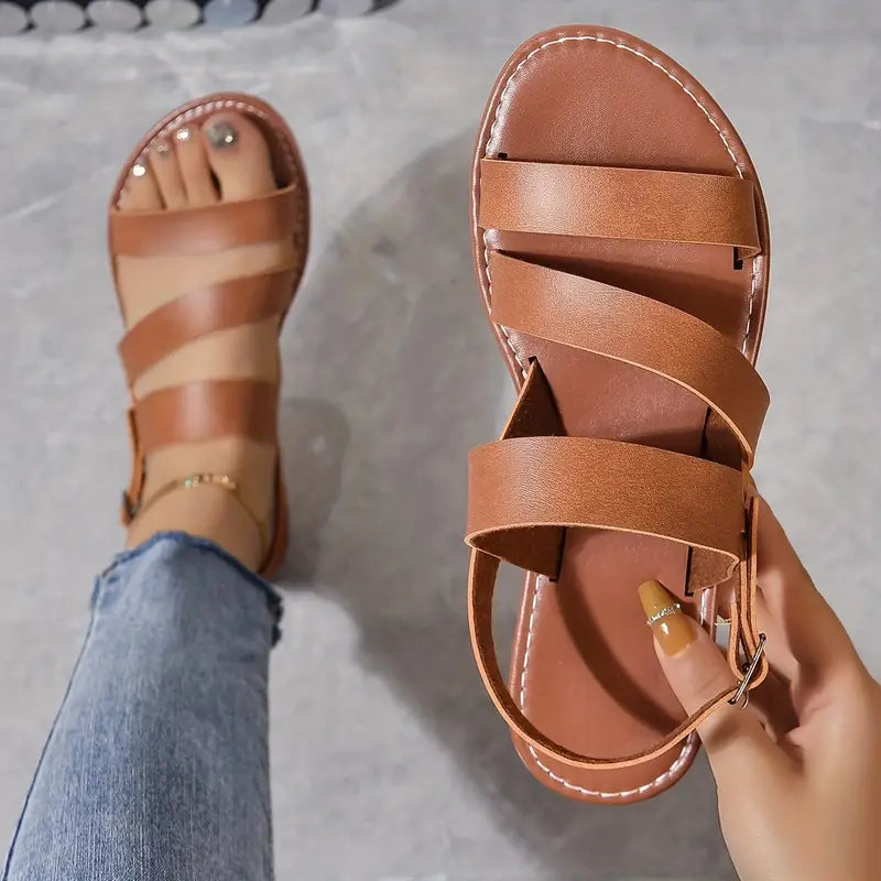 LM | Flat sandals with open back and buckle decoration